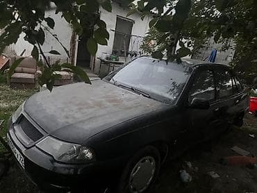 Daewoo Nexia: 2009 г., Механика, Газ, Седан — 2