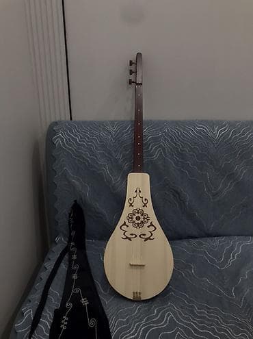 Музыкалык аспаптар: Комуз Национальный - Корпус каплевидной формы из светлой древесины — 1