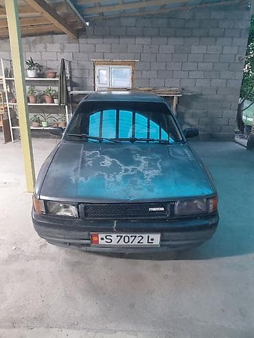 кызыл бирдик: Mazda 323: 1989 г., 1.6 л, Кол менен иштөөчү, Бензин, Седан — 1