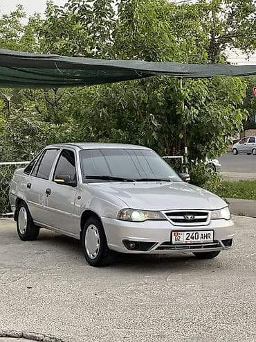pasat b5: Daewoo Nexia: 2010 г., Седан — 1