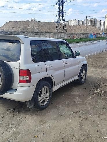 Mitsubishi Pajero iO: 2003 г., 2 л, Автомат, Бензин, Внедорожник — 1
