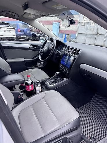 фолсфаген джетта: Volkswagen Jetta: 2013 г., 1.4 л, Автомат, Гибрид, Седан — 3