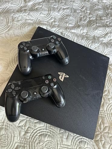 купить игровой руль для пк: PlayStation 4 Slim с двумя беспроводными геймпадами DualShock 4 — 3