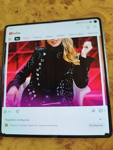 Смартфон с безрамочным дисплеем с отверстием под фронтальную камеру в — 4