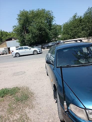 мереке авто слив: Mazda Cronos: 1993 г., 2 л, Автомат, Бензин, Седан — 1