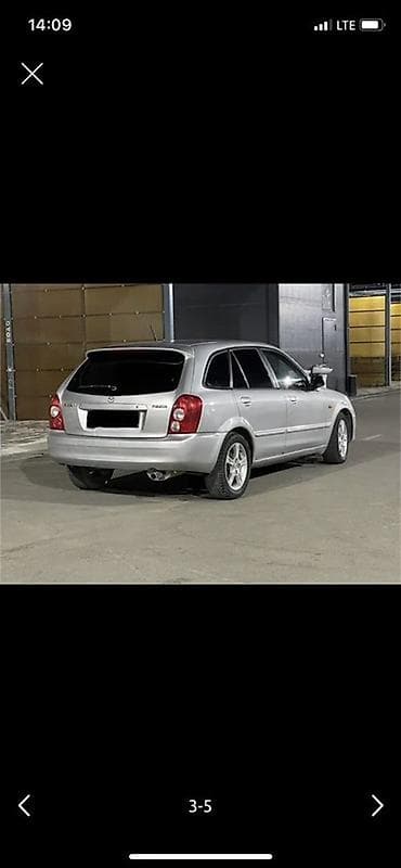 e34 520: Mazda 3: 2002 г., 1.6 л, Механика, Бензин, Хэтчбэк — 4