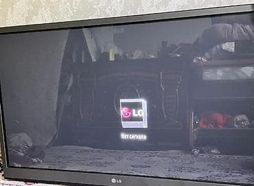 Телевизор LG, диагональ около 32–37". Плоская ЖК‑панель, тонкая рамка — 2