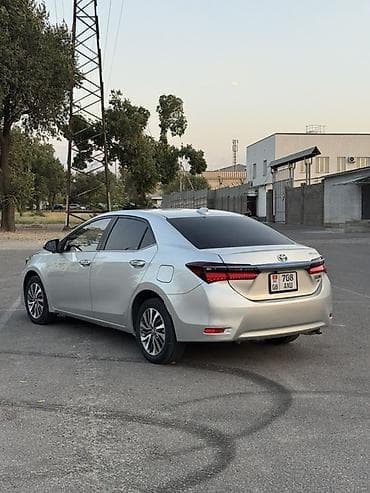 byd e2 2019: Toyota Corolla: 2020 г., 1.8 л, Вариатор, Гибрид, Седан — 2