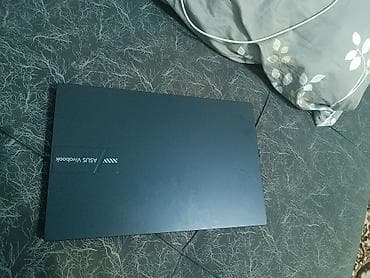 macbook pro 2010: ASUS VivoBook 14 (серия X1404VA) Ключевые характеристики по наклейкам — 4