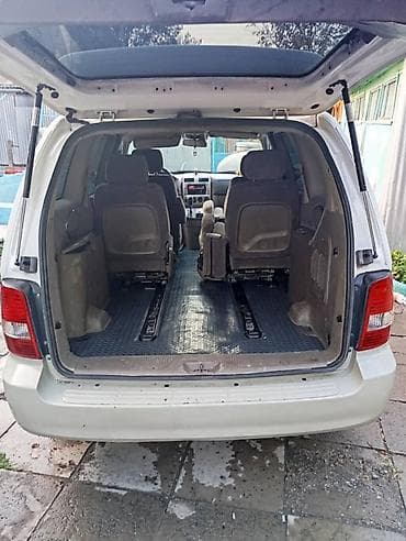 9: Kia Carnival: 2002 г., 2.9 л, Автомат, Дизель, Минивэн — 8