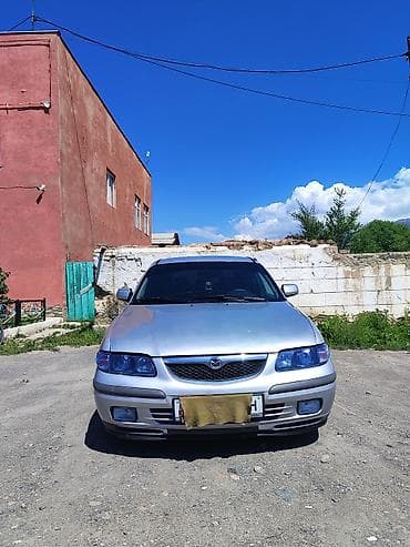 s class w220: Mazda 626: 1999 г., 1.8 л, Механика, Бензин, Хэтчбэк — 1