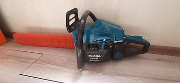 Бензопила Makita CS5800. Объем двигателя: 58 куб. см (58 CC) — 1