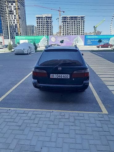 капелла 626: Mazda Capella: 1999 г., 2 л, Механика, Бензин, Универсал — 6
