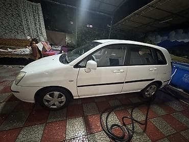 даево такума: Suzuki Liana: 2002 г. — 4