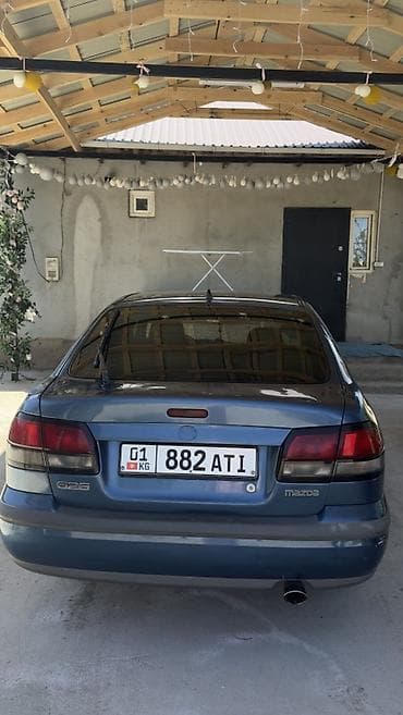 Mazda: Mazda 626: 1997 г., 1.8 л, Механика, Газ, Седан — 6
