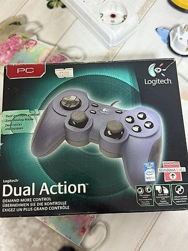 Logitech Dual Action — проводной геймпад для ПК и Mac. Особенности: -