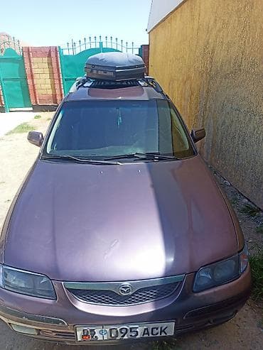 сг 9: Mazda 626: 1999 г., 1.8 л, Механика, Бензин, Универсал — 4