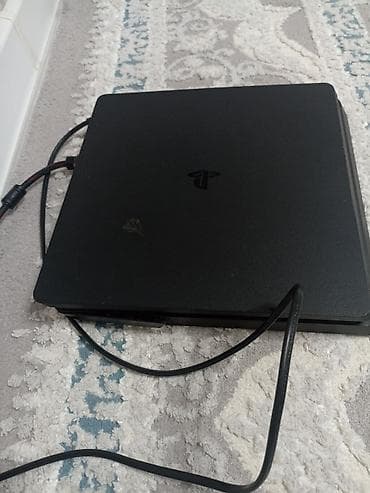 Продаю игровую приставку Sony PlayStation 4 Slim в хорошем б/у at lalafo.kg Продаю игровую приставку Sony PlayStation 4 Slim в хорошем б/у