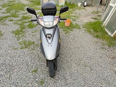 dio 27 af27: Скутер Honda (серия Dio) в серебристом цвете. Характеристики и — 4