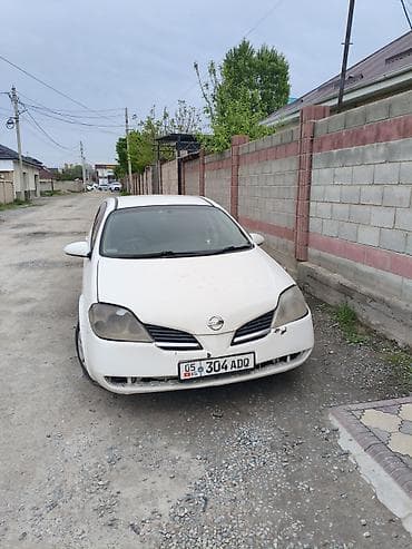 митсубиси спейс стар: Nissan Primera: 2002 г., Универсал — 3