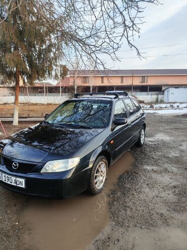Продажа авто: Mazda 323: 2003 г., 1.6 л, Механика, Бензин, Универсал — 4