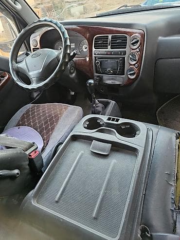 надувной гараж: Kia Bongo (тоннажный малотоннажник) с тентованным кузовом. - Тип — 6