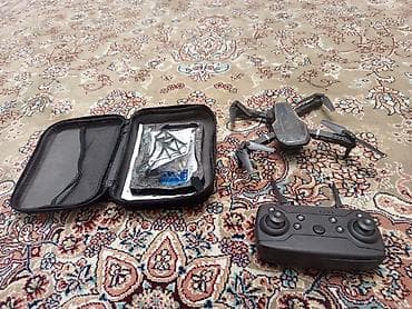 вертолет на дистанционном управлении: Складной квадрокоптер с пультом ДУ и комплектом аксессуаров. Что в — 1