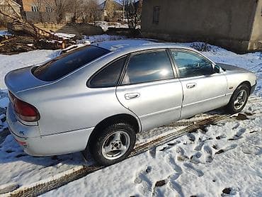 бардачок для скутера: Mazda Cronos: 1997 г., 1.8 л, Механика, Бензин, Хэтчбэк — 2