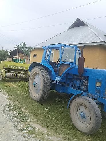 Унаа: Трактор с пресс-подборщиком для заготовки сена - Трактор Беларус — 1