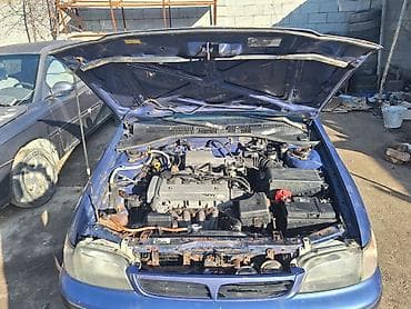 марк ц: Toyota Carina E: 1997 г., 1.8 л, Механика, Бензин, Универсал — 9