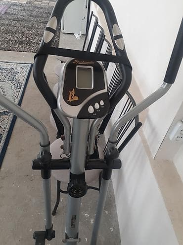 Эллиптический тренажёр (орбитрек) с компьютерным блоком - Тип