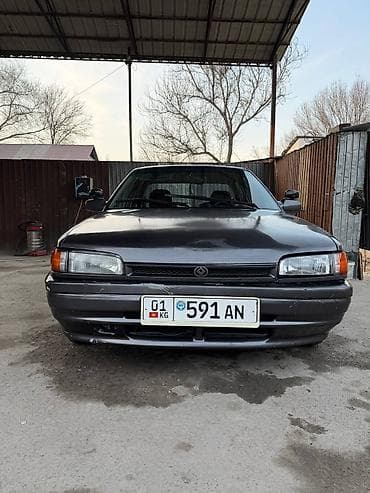 Mazda 323: 1992 г., 1.6 л, Автомат, Бензин, Седан