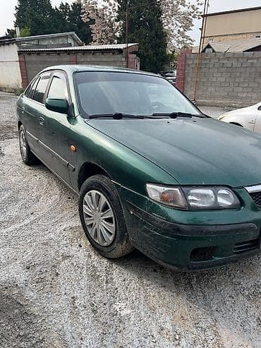 kia stringer: Mazda 626: 1998 г., 2 л, Автомат, Бензин, Седан — 5