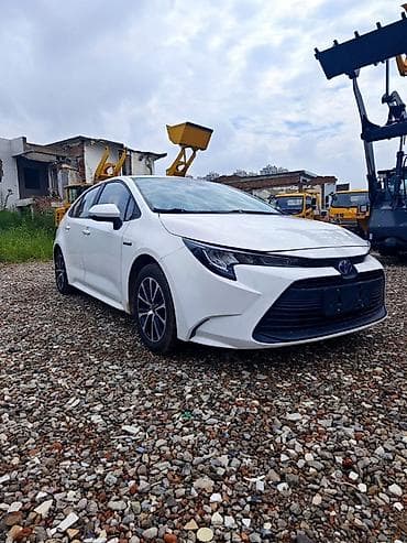 coroll: Toyota Corolla: 2023 г., 1.8 л, Гибрид, Седан — 1