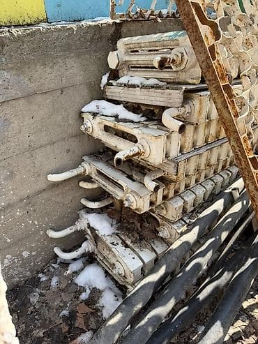 мастит: Чугунные радиаторы отопления (секции разной длины и высоты) Описание — 4