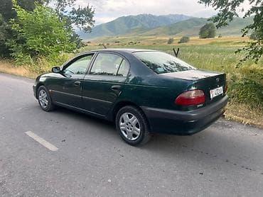 Toyota Avensis: 2001 г., 1.8 л, Механика, Газ, Седан — 2