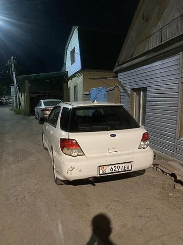 Subaru Impreza: 2003 г., 1.5 л, Автомат, Бензин, Хэтчбэк — 7