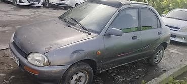 1216 5: Mazda 121: 1991 г., 1.3 л, Механика, Бензин — 3