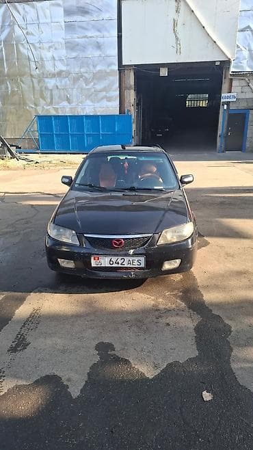 Mazda 323: 2002 г., 1.6 л, Механика, Бензин, Универсал