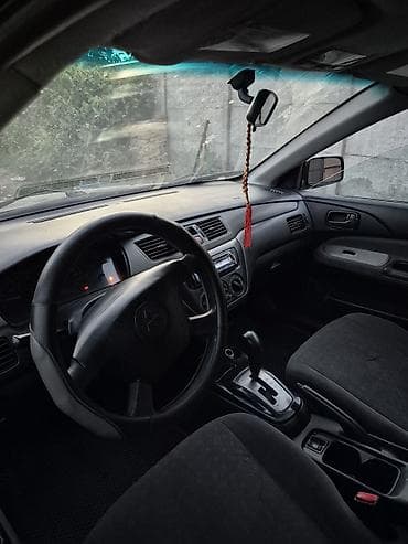 Продажа авто: Mitsubishi Lancer: 2005 г., Универсал — 4