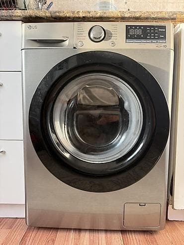 lg oled: Стиральная машина LG с фронтальной загрузкой, серебристый корпус — 1