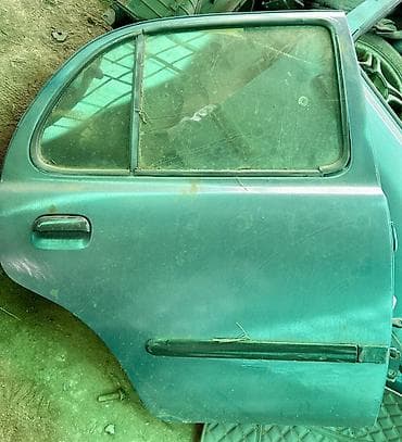 mazda 121: Дверь Задняя левая Nissan, Оригинал — 1