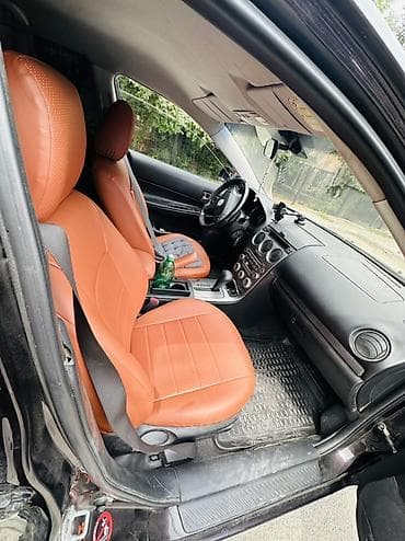 diska 14: Mazda 6: 2005 г., 2 л, Автомат, Бензин, Седан — 8