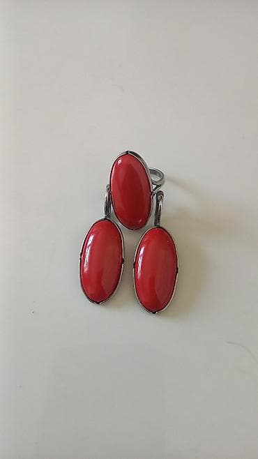 Комплект украшений из металла с крупными овальными кабошонами. Размер