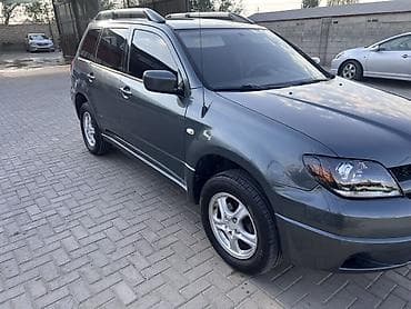 215 60 16 шина: Mitsubishi Outlander: 2003 г., 2.4 л, Автомат, Бензин, Кроссовер — 4