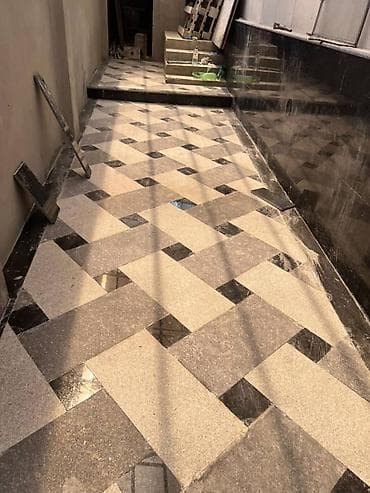 Благоустройство частной территории: укладка гранитной плитки и