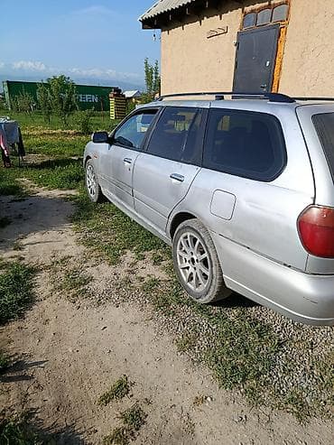 Nissan Primera: 2001 г., 2 л, Вариатор, Бензин, Универсал