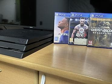 redmi: PlayStation 4 Pro (PS4 Pro), цвет черный. Комплектация и особенности — 1