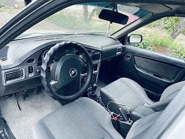 Daewoo Nexia: 2010 г., 1.5 л, Механика, Бензин, Седан