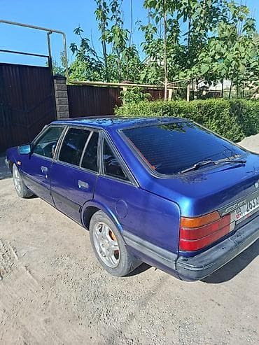 step rf3: Mazda 626: 1987 г., Хэтчбэк — 2